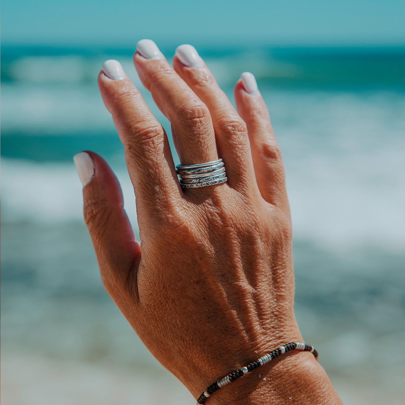 Tropical Stacker Rings